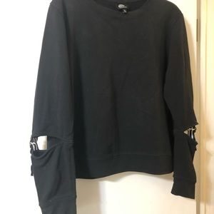 Black sweatshirt with cut out on sleeve